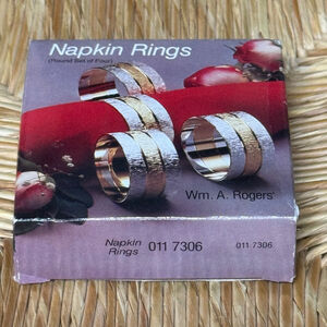 Wm. A. Rogers Silver-plated Gold-tone Napkin Brings Textured, Two-tone Design
